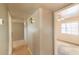 Light and airy hallway with wood flooring at 6908 E Windsor Ave, Scottsdale, AZ 85257