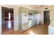 Kitchen view, light green cabinets, wood floor at 6908 E Windsor Ave, Scottsdale, AZ 85257