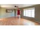 Spacious living room with hardwood floors and large window at 6908 E Windsor Ave, Scottsdale, AZ 85257