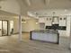 Open concept kitchen with large island and breakfast bar at 7955 E Chaparral Rd # 103, Scottsdale, AZ 85250