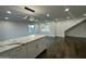 Open concept kitchen with island and marble countertops at 8050 E Tuckey Ln, Scottsdale, AZ 85250