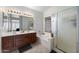 Bathroom boasts a double vanity and a relaxing bathtub at 1041 W Chilton Ave, Gilbert, AZ 85233