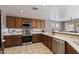 Modern kitchen with stainless steel appliances and ample counter space at 1041 W Chilton Ave, Gilbert, AZ 85233