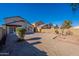 Large backyard with gravel, fire pit, and trees at 7313 N 69Th Ave, Glendale, AZ 85303