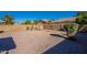 Spacious backyard with gravel and desert landscaping at 7313 N 69Th Ave, Glendale, AZ 85303