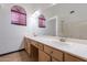 Bathroom with double vanity and large mirror at 7313 N 69Th Ave, Glendale, AZ 85303