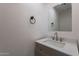 Modern bathroom with updated vanity and quartz countertop at 7313 N 69Th Ave, Glendale, AZ 85303