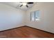 Spacious bedroom with wood floors and a ceiling fan at 7313 N 69Th Ave, Glendale, AZ 85303