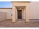 Ornate front door entrance with a covered walkway at 7313 N 69Th Ave, Glendale, AZ 85303