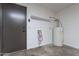 Laundry room with washer, dryer hookups, and shelving at 7313 N 69Th Ave, Glendale, AZ 85303