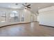 Spacious living room with vaulted ceiling and wood-look floors at 7313 N 69Th Ave, Glendale, AZ 85303