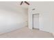 Bright bedroom featuring a large closet and ceiling fan at 1108 W Mango Dr, Gilbert, AZ 85233