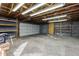 Spacious garage with ample storage shelving at 114 W Ivanhoe Pl, Chandler, AZ 85225