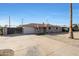 House exterior with a driveway and palm tree in front at 2101 W Palmaire Ave, Phoenix, AZ 85021