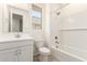 Bright bathroom with shower-tub combo, sink and window at 2848 N Evergreen St, Buckeye, AZ 85396