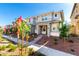 A modern two-story home with a landscaped front yard, stone accents, and inviting entrance at 2848 N Evergreen St, Buckeye, AZ 85396