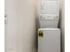 Bright laundry with stacked washer and dryer at 2848 N Evergreen St, Buckeye, AZ 85396