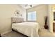 Bright bedroom with a queen bed and neutral decor at 32722 N 23Rd Ave, Phoenix, AZ 85085