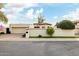 Charming single-Gathering home featuring a red tile roof, stucco walls, and mature landscaping at 629 E Myrtle Ave, Phoenix, AZ 85020