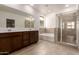 Double vanity bathroom with soaking tub and walk-in shower at 7280 E White Tail Rd, San Tan Valley, AZ 85143