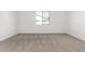 Well-lit bedroom with carpet and window offering natural light at 7280 E White Tail Rd, San Tan Valley, AZ 85143