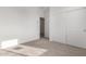 Bright bedroom featuring carpet, and double door closet at 7280 E White Tail Rd, San Tan Valley, AZ 85143