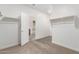Large walk-in closet with double hanging rods and access to bathroom at 7280 E White Tail Rd, San Tan Valley, AZ 85143