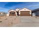 Single-story house with brown garage door and landscaping at 7280 E White Tail Rd, San Tan Valley, AZ 85143