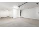 Spacious garage with overhead door at 7280 E White Tail Rd, San Tan Valley, AZ 85143