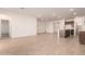 Spacious living room with tile flooring and access to the backyard at 7280 E White Tail Rd, San Tan Valley, AZ 85143