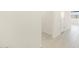 Bright hallway featuring neutral paint, clean lines, and ceramic tile at 16032 W Desert Hollow Dr, Surprise, AZ 85387