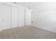 Bedroom features plush carpeting and a spacious closet at 16066 W Prickly Pear Trl, Surprise, AZ 85387