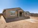New construction home showcasing a spacious dirt backyard, ready for customization and landscaping at 16072 W Prickly Pear Trl, Surprise, AZ 85387