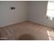 Bright bedroom with neutral walls and carpeted floor at 17134 N Eureka Trl, Surprise, AZ 85374