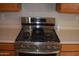 Stainless steel gas cooktop with griddle at 17134 N Eureka Trl, Surprise, AZ 85374