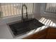 Modern kitchen sink with a pull-down faucet at 17134 N Eureka Trl, Surprise, AZ 85374