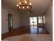 Bright living room with hardwood floors and patio access at 17134 N Eureka Trl, Surprise, AZ 85374