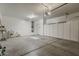 Clean and spacious garage featuring ample storage cabinets and an attached utility sink at 4202 E Broadway Rd # 132, Mesa, AZ 85206