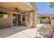 Covered patio features shade, desert landscaping and comfortable seating with privacy walls at 4202 E Broadway Rd # 132, Mesa, AZ 85206