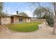 Large backyard with a covered patio and artificial turf at 517 W 17Th St, Tempe, AZ 85281