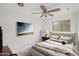Cozy bedroom with a comfortable bed, natural light, and a serene ambiance, perfect for relaxation at 517 W 17Th St, Tempe, AZ 85281