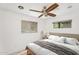 Comfortable bedroom with neutral tones, natural light, ceiling fan and a calming atmosphere at 517 W 17Th St, Tempe, AZ 85281