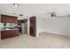 Open kitchen featuring stainless steel appliances, tile flooring, and ample cabinet space at 517 W 17Th St, Tempe, AZ 85281
