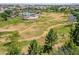 Aerial view of community park with pool, playground, and tennis courts at 10605 E Monterey Ave, Mesa, AZ 85209