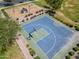 Outdoor basketball court with playground nearby at 10605 E Monterey Ave, Mesa, AZ 85209