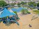 Community features a playground, basketball court, and ample green space at 10605 E Monterey Ave, Mesa, AZ 85209