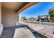 Covered front porch with a view of the neighborhood at 14953 W Cortez St, Surprise, AZ 85379