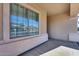 Covered front porch with a view of the neighborhood at 14953 W Cortez St, Surprise, AZ 85379