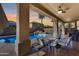 Peaceful patio at sunset overlooking the pool at 14953 W Cortez St, Surprise, AZ 85379