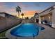 Relaxing kidney-shaped pool in a sunny backyard at 14953 W Cortez St, Surprise, AZ 85379